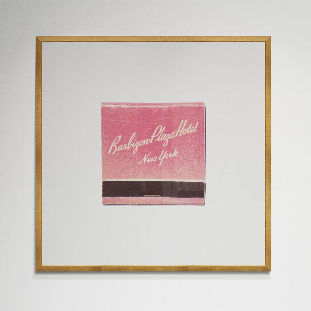 Barbizon Plaza matchbook print in gold frame on wall