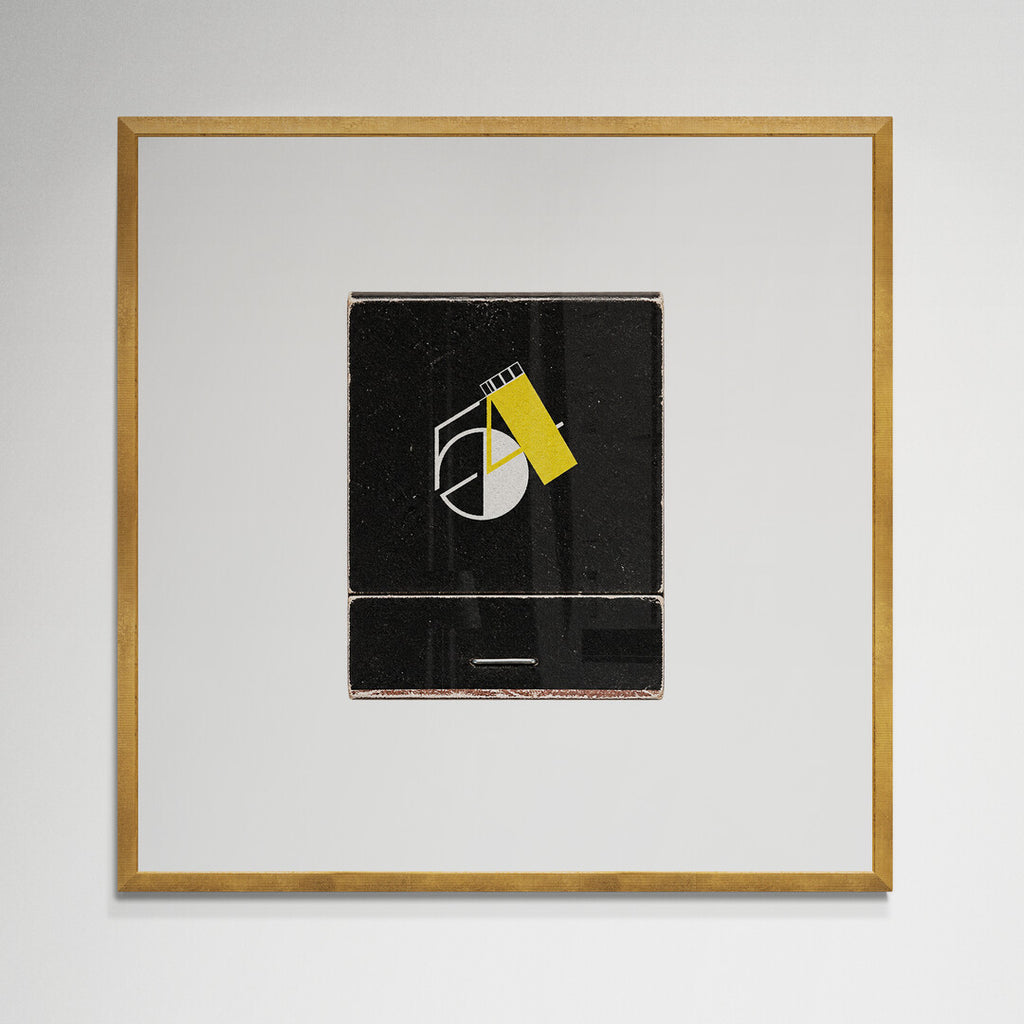 Studio 54 matchbook print in gold frame on wall
